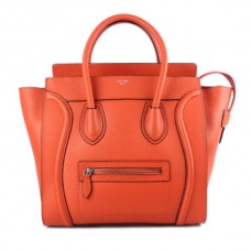 Borsa a mano Celine Large Luggage Tote color arancione neon.