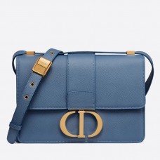 Borsa Dior 30 Montaigne in pelle di vitello martellata blu denim.